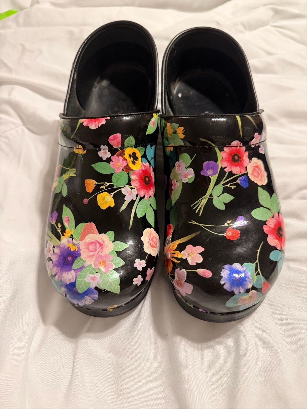 Dansko Black Floral Patent Clogs